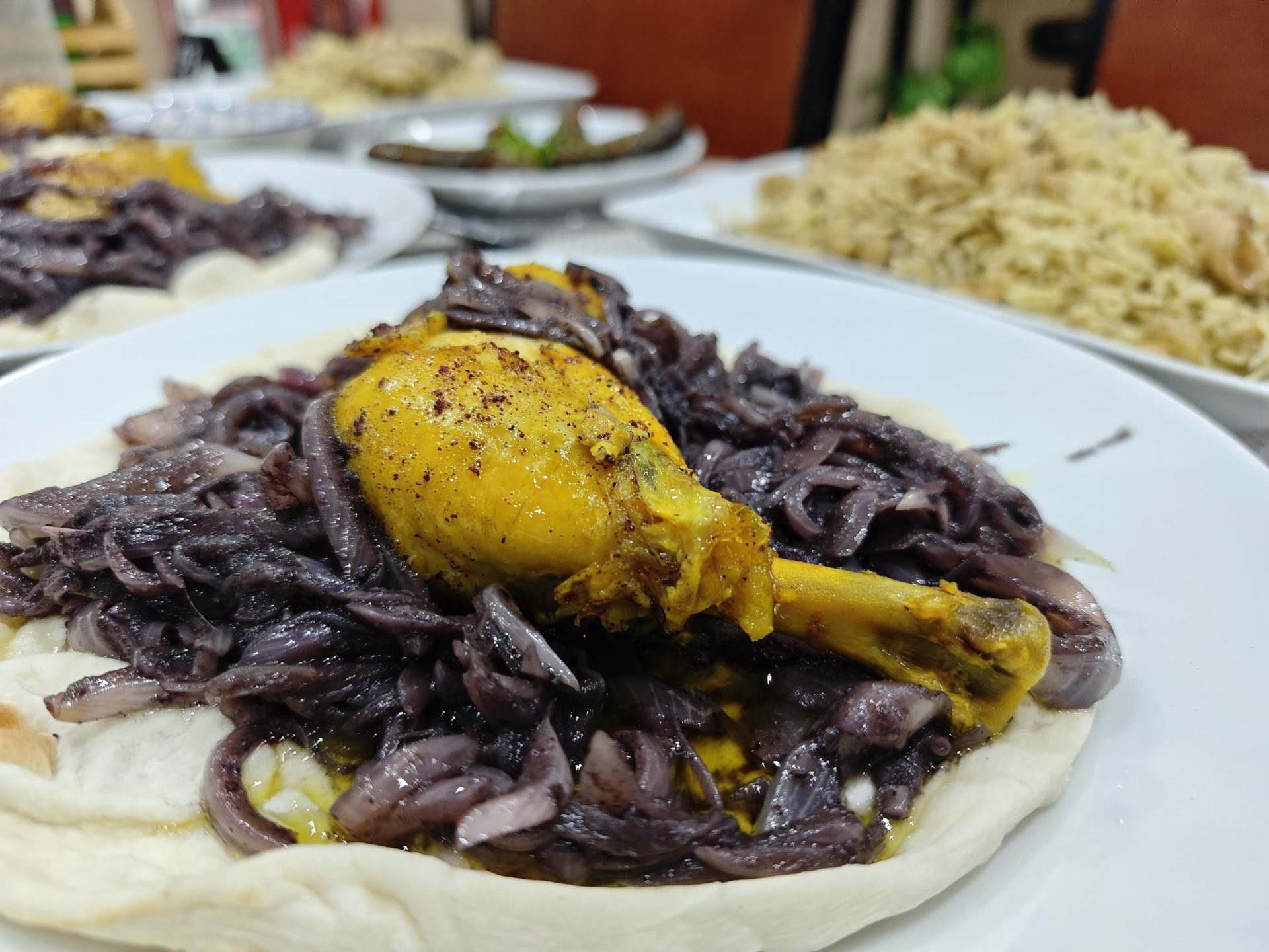 An Arabic dinner featuring traditional musakhan
